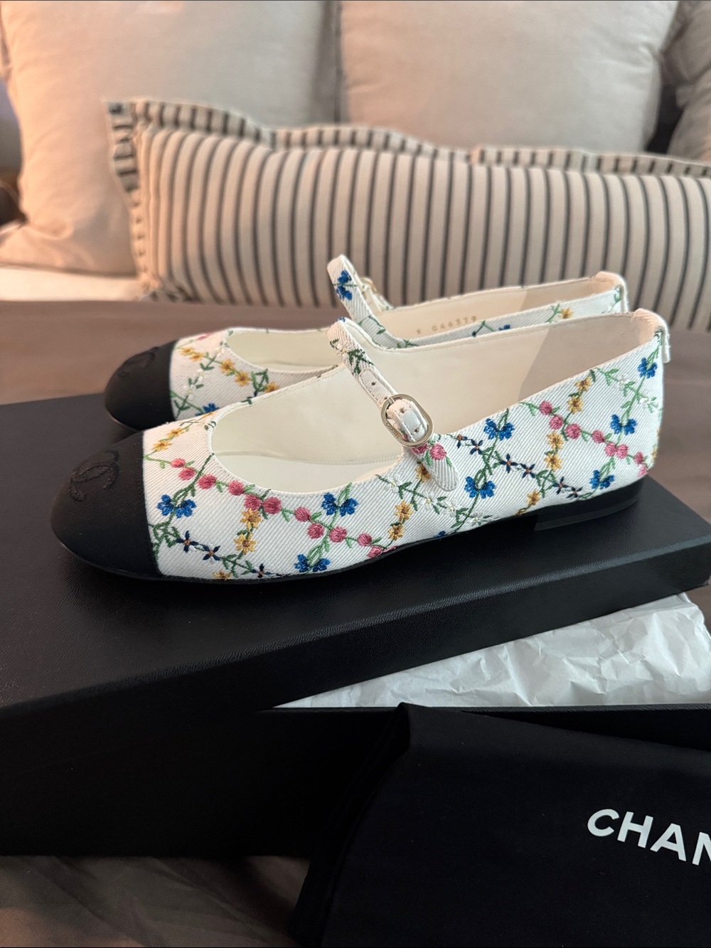 CHANEL White Floral Mary Jane Flats with Black Cap Toe - Picture 2 of 7